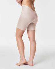 SPANXshape™ Suit Your Fancy Low-Back Mid-Thigh Short | Champagne Beige